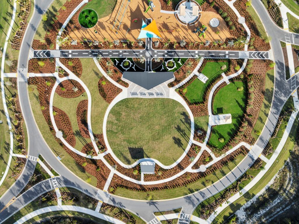Overhead aerial view of the Skipping Stone park lawn, pavilion and playground