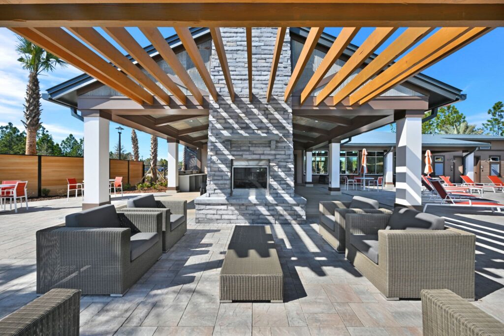 Outdoor fireplace and pergola seating at The Landings at St Johns
