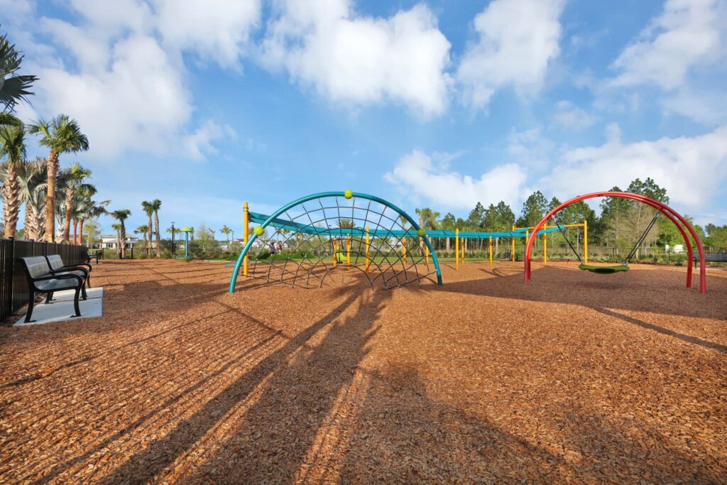 Climbing dome and swings at the Skipping Stone playground