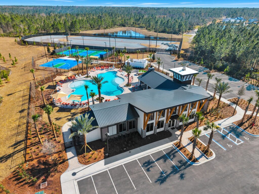 Aerial view of the pool, courts and clubhouse at The Landings at St Johns