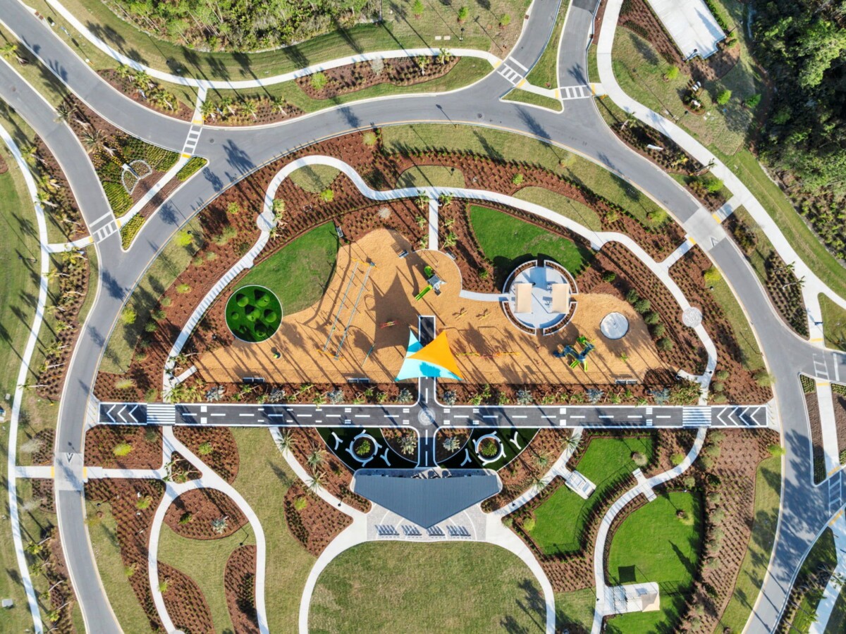 Overhead aerial view of the Skipping Stone community park, playground and walking paths