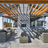 Outdoor fireplace and pergola seating at The Landings at St Johns