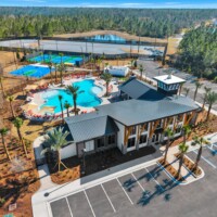 Aerial view of the pool, courts and clubhouse at The Landings at St Johns